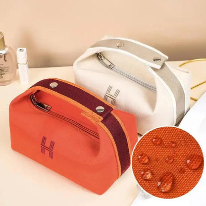 Contemporary Canvas Toiletry Bag with Bold Orange Design
