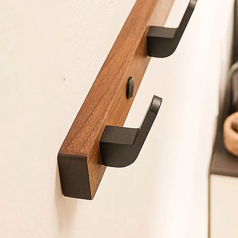 Wall-Mounted Wood and Metal Coat Rack with Minimalist Black Hooks